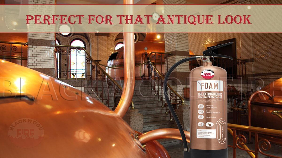 Brushed antique copper fire extinguisher in brewery -Designer gold, silver and copper finish fire extinguishers