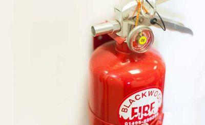How do I use a fire extinguisher?
